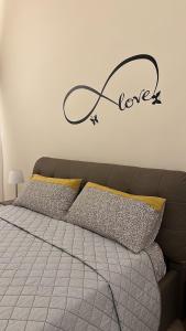 Postel nebo postele na pokoji v ubytování B&B Piano Romano -con parcheggio privato gratuito-