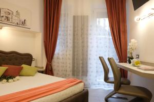 Postel nebo postele na pokoji v ubytování LeNotti Verona
