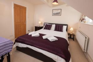 Postel nebo postele na pokoji v ubytování Kentdale - a lovely family home in Ambleside
