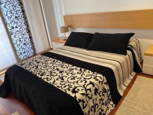Posteľ alebo postele v izbe v ubytovaní Apartamento próximo a la playa