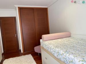 Posteľ alebo postele v izbe v ubytovaní Apartamento próximo a la playa