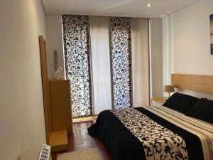 Posteľ alebo postele v izbe v ubytovaní Apartamento próximo a la playa