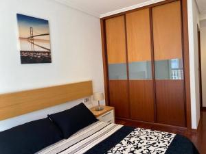 Posteľ alebo postele v izbe v ubytovaní Apartamento próximo a la playa