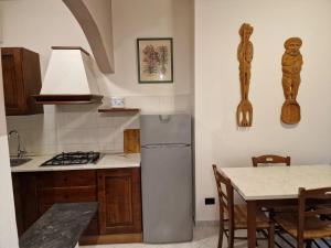 Η κουζίνα ή μικρή κουζίνα στο Casa Romantica Tra Liguria e Toscana +12 φωτογραφίες