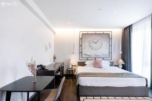 Ένα ή περισσότερα κρεβάτια σε δωμάτιο στο SOOKNIRUND HOTEL