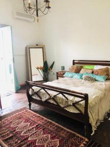 Una cama o camas en una habitación de AlSantuario