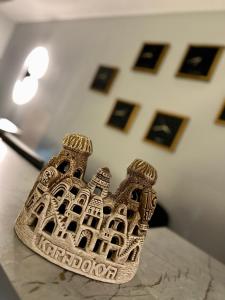 a statue of the eiffel tower on a table at Skymoon Istanbul Airport Hotel in Arnavutköy