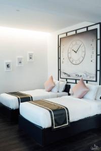 Ένα ή περισσότερα κρεβάτια σε δωμάτιο στο SOOKNIRUND HOTEL