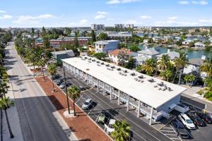 an overhead view of a parking lot with a building at Funshine Sunset Beach in St. Pete Beach