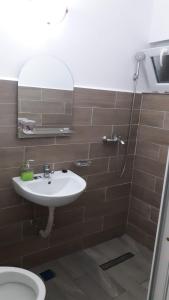 Ванная комната в CASA DRAGOȘ