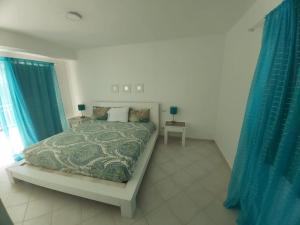 Postel nebo postele na pokoji v ubytování SOL CARIBE BEACH