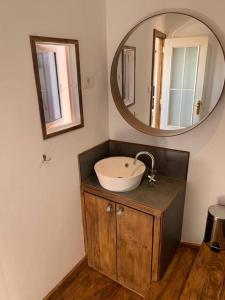 a bathroom with a sink and a mirror at Romantic eco retreat in Adeje