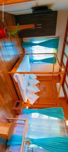 an overhead view of a bedroom with bunk beds at Little Chembaka in Kumarakom