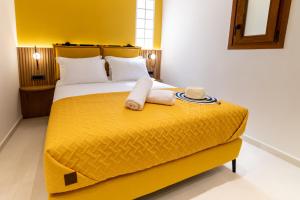 Ένα ή περισσότερα κρεβάτια σε δωμάτιο στο Bella Vasilica Luxury Apartments