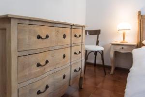 Postel nebo postele na pokoji v ubytování Residence Ledro