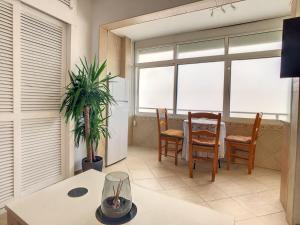 TV a/nebo společenská místnost v ubytování Urban&Vacay! Suite - Torremolinos City Centre