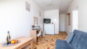 Telewizja i/lub zestaw kina domowego w obiekcie Ledan