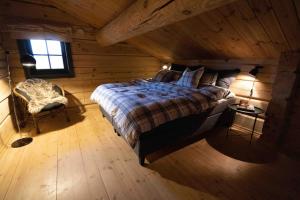 Кровать или кровати в номере Roalden Mountain Lodge