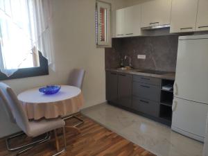 Kuchyň nebo kuchyňský kout v ubytování Apartman Budimir1