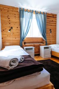 Łóżko lub łóżka w pokoju w obiekcie Backcountry