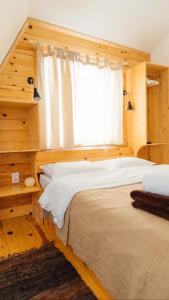 Łóżko lub łóżka w pokoju w obiekcie Backcountry