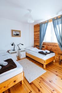 Łóżko lub łóżka w pokoju w obiekcie Backcountry