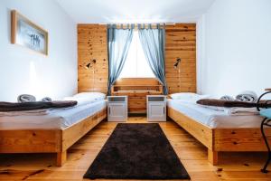 Łóżko lub łóżka w pokoju w obiekcie Backcountry