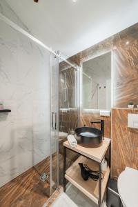 Koupelna v ubytování Zeus Design Apartmenthaus