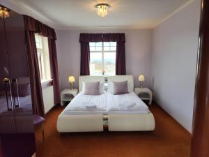 Postel nebo postele na pokoji v ubytování Kiljan Apartments & Rooms