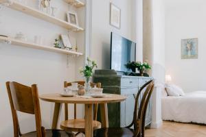 a small dining room with a table and chairs at CYPRIAN apartment in Banská Štiavnica