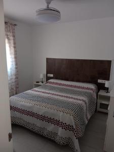 Ένα ή περισσότερα κρεβάτια σε δωμάτιο στο Siorica Beach