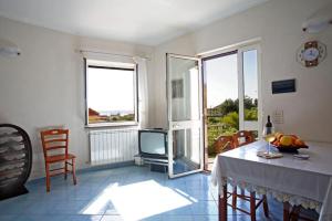 TV a/nebo společenská místnost v ubytování Bed & Breakfast Fuocomuorto