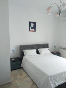 Letto o letti in una camera di Affittacamere Casa Flora