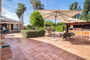 Κήπος έξω από το Alghero Villa Galatea con giardino per 8 persone vicino alla spiaggia con 4 camere