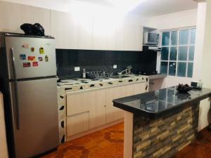 Kuchyň nebo kuchyňský kout v ubytování Casa ISABELLA - Playa dormida + 33 fotografií