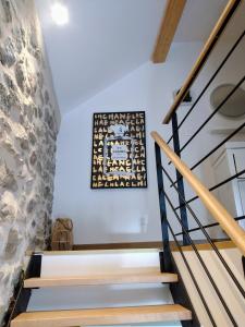 A bed or beds in a room at Chambre d hôtes avec 2 petits déjeuners ou Gîte