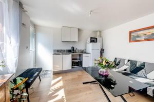 Köök või kööginurk majutusasutuses Appartement/maison plain pied