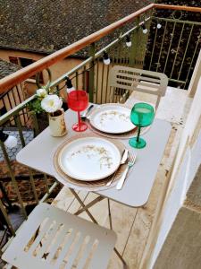 A balcony or terrace at Chambre d hôtes avec 2 petits déjeuners ou Gîte