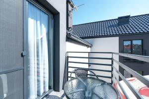 Balkon lub taras w obiekcie PIONOW Pokoje Hotelowe - adults only