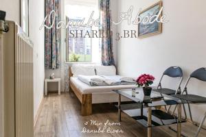 Postel nebo postele na pokoji v ubytování Convenient Shared Apartment - near Danube & Millenium Tower