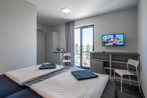 Łóżko lub łóżka w pokoju w obiekcie PIONOW Pokoje Hotelowe - adults only