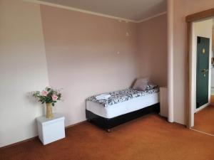 Postel nebo postele na pokoji v ubytování Kiljan Apartments & Rooms