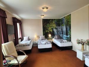 Postel nebo postele na pokoji v ubytování Kiljan Apartments & Rooms