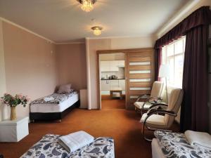 Postel nebo postele na pokoji v ubytování Kiljan Apartments & Rooms