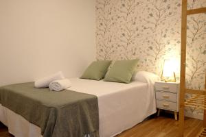 Postel nebo postele na pokoji v ubytování Alameda Apartamentos