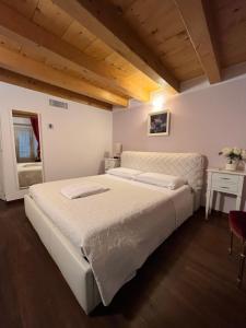 Ένα ή περισσότερα κρεβάτια σε δωμάτιο στο Dimora 4 Spade