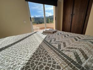 A bed or beds in a room at Dúplex Río Madera