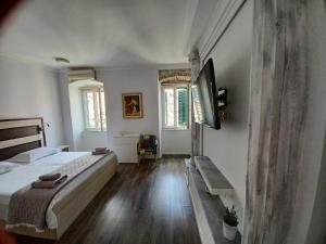 Postel nebo postele na pokoji v ubytování JR Luxury Guesthouse