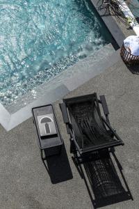 A piscina localizada em She Mykonos Boutique Hotel ou nos arredores