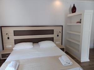 Postel nebo postele na pokoji v ubytování JR Luxury Guesthouse